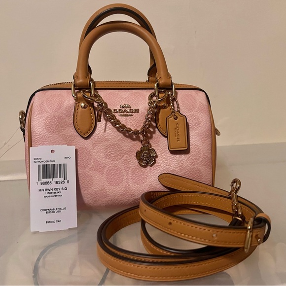 Coach Handbags - Coach Petal Pink Signature Mini Rowan Satchel w/ charm chain